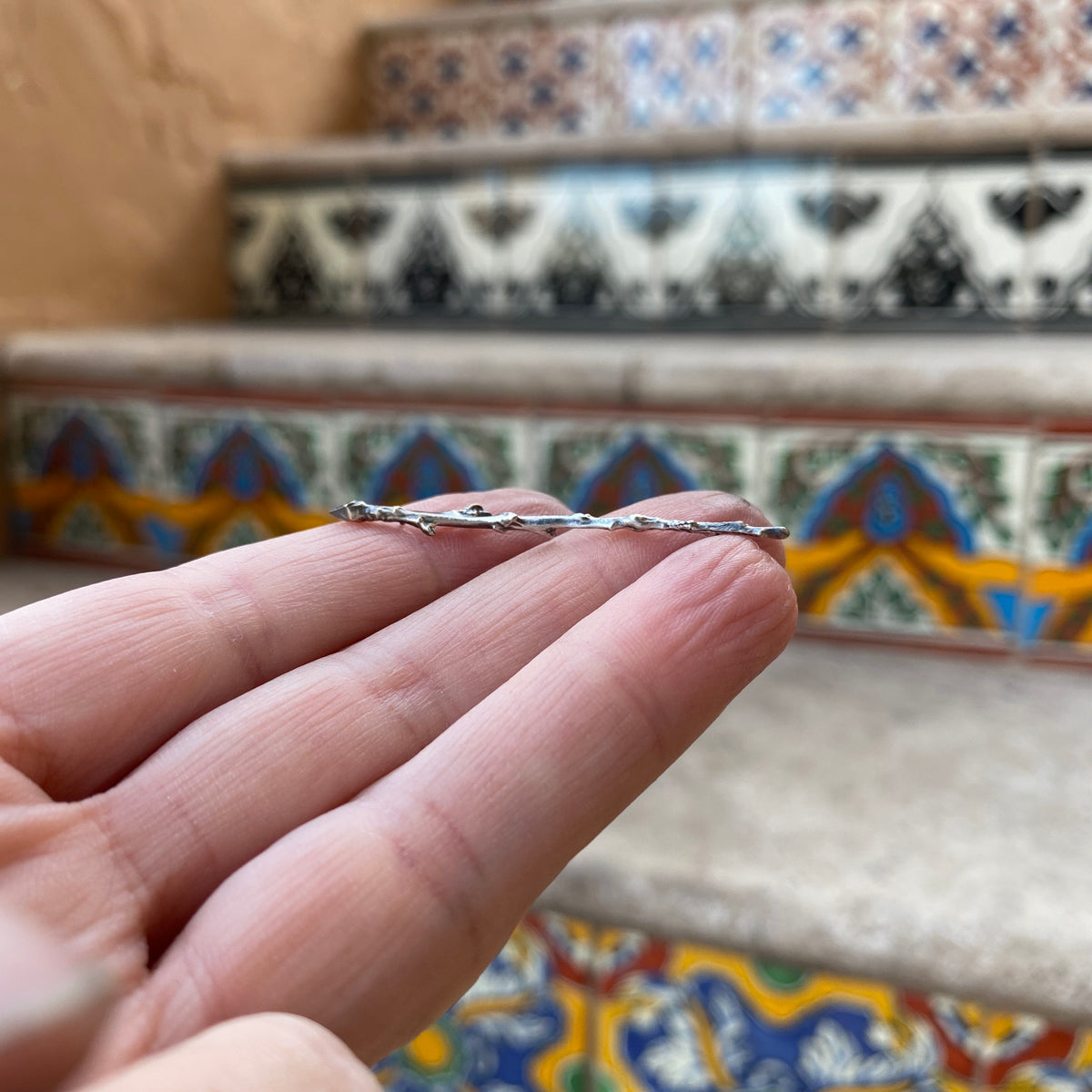 cast twig for jewelry making on fingers