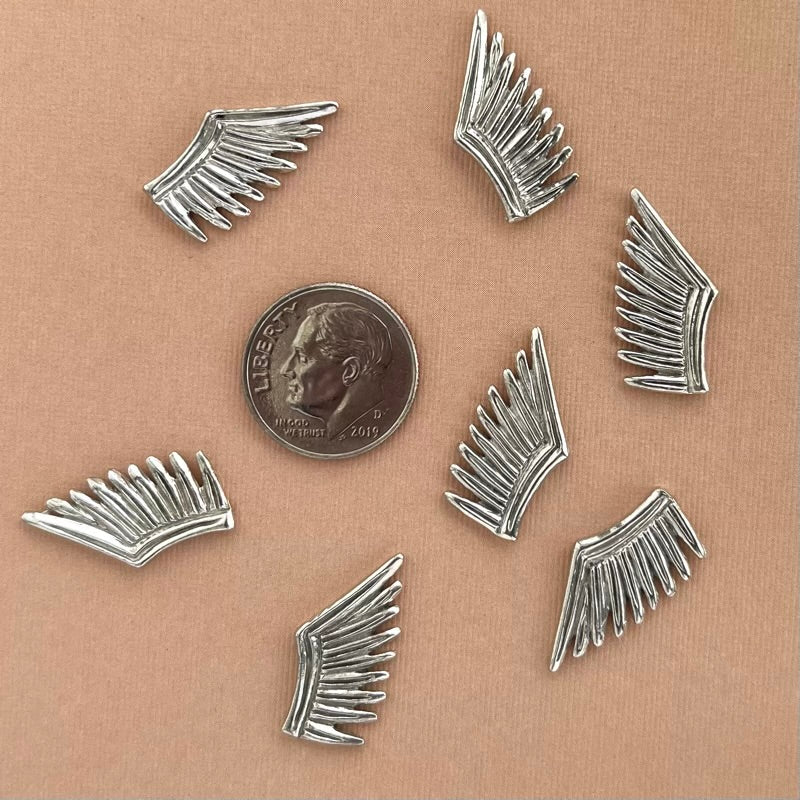 silver wing charm