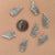 silver wing charm